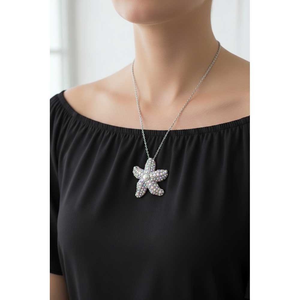 Model wearing Pearl and crystal starfish necklace with a black top - Lilylin Designs