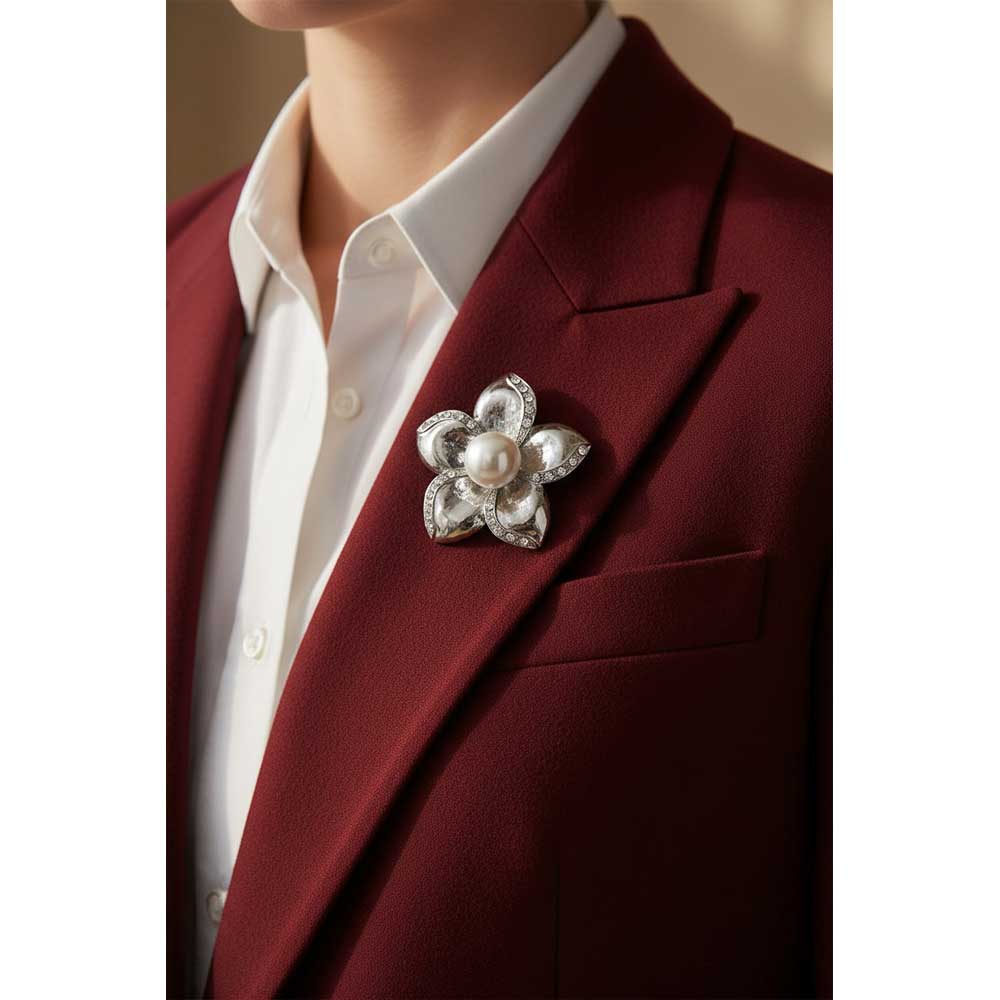 Model wearing Pearl flower brooch pin on  a dark red jacket with a white shirt - Lilylin Designs
