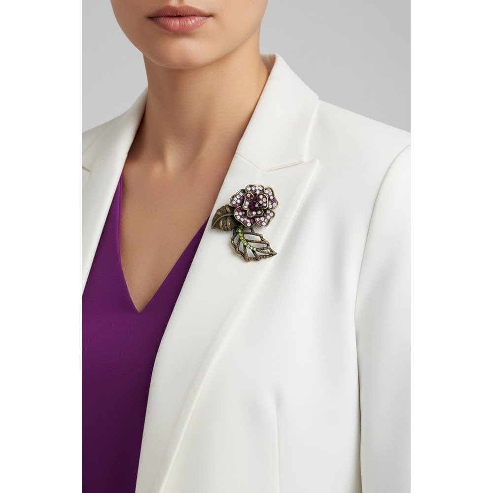 Model wearing Purple and green flower brooch pin on a white jacket with a purple top - Lilylin Designs