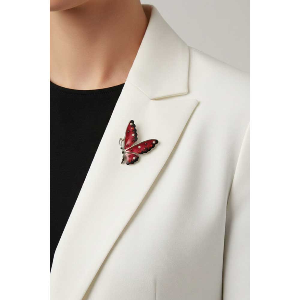 Model wearing Red and black butterfly lapel tac pin on a white jacket with a black top - Lilylin Designs