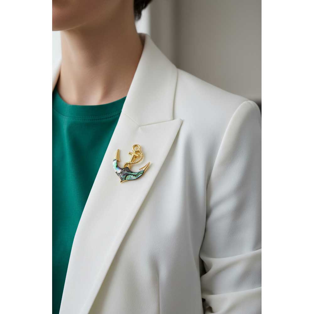 Model wearing Shell anchor brooch pin on a white jacket with a green t-shirt - Lilylin Designs
