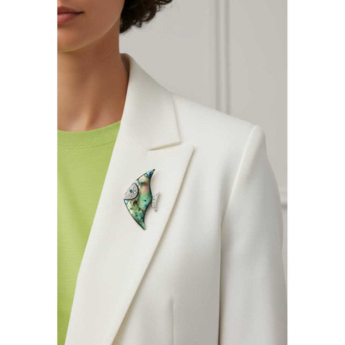 Model wearing Shell angelfish brooch pin on a white jacket with a lime green t-shirt - Lilylin Designs