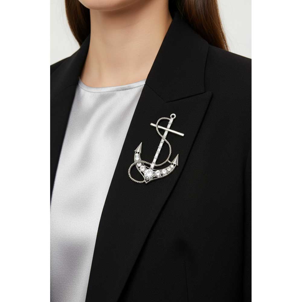 Model wearing Silver anchor brooch pin on a black jacket - Lilylin Designs