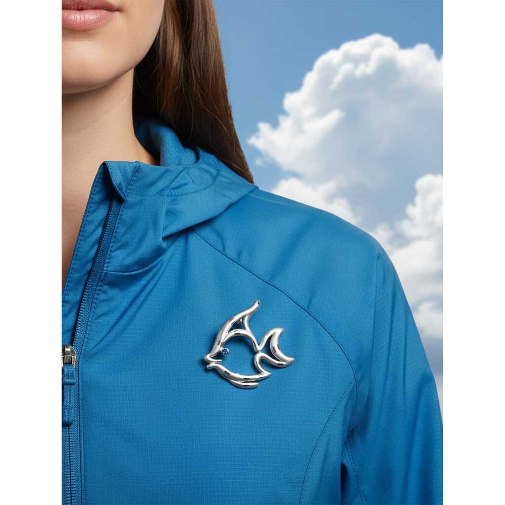 Model wearing Silver angel fish brooch pin on a blue jacket - Lilylin Designs