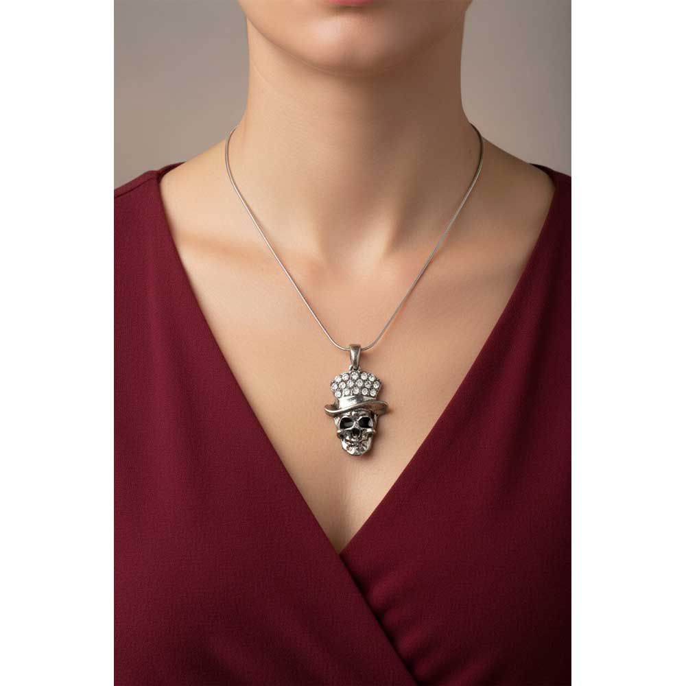 Model wearing Skull with crystal hat necklace paired with a red v neck top - Lilylin Designs