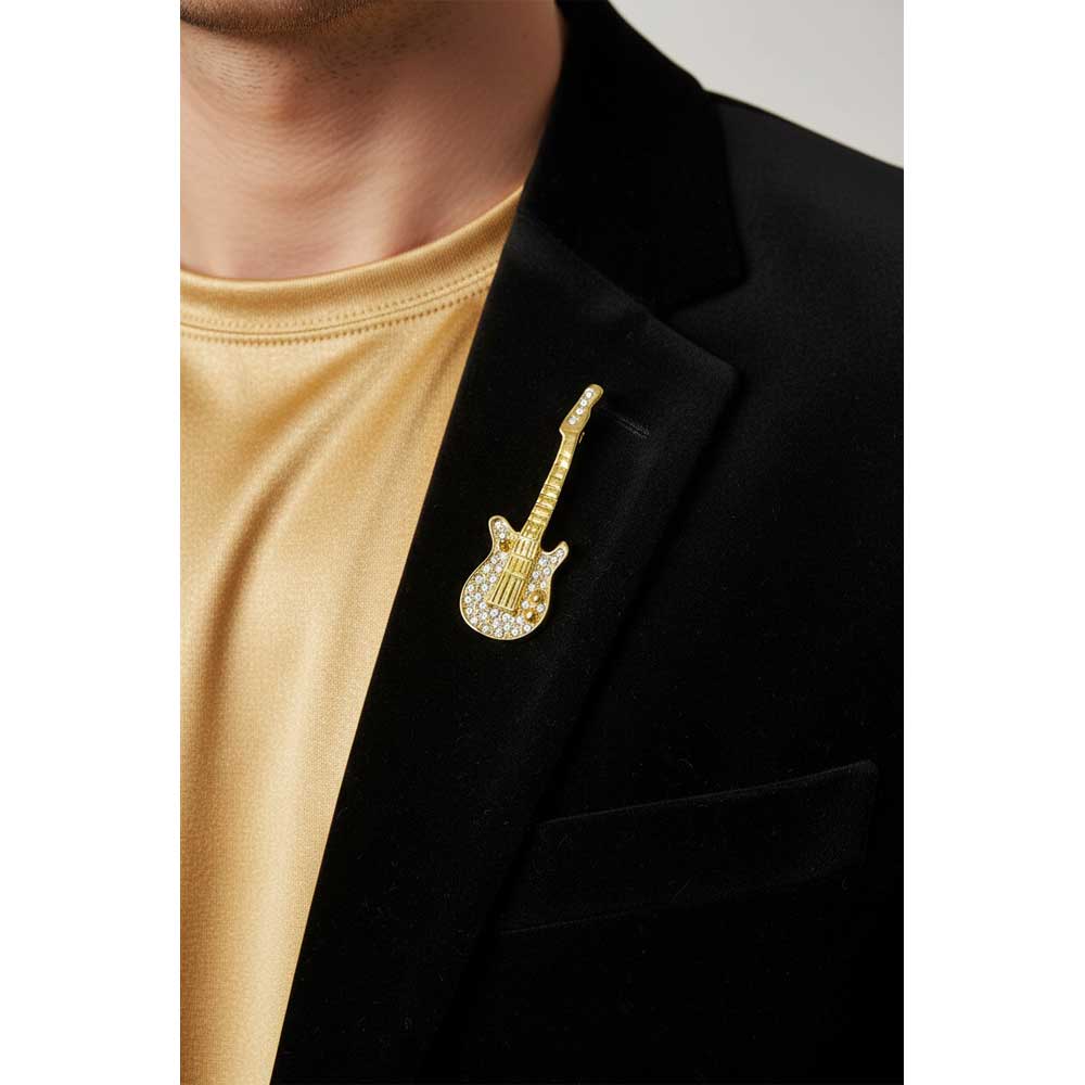 Model wearing Small Guitar brooch pin on a black jacket with a gold shirt - Lilylin Designs
