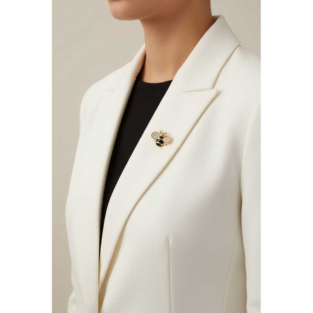 Model wearing Small bee lapel tac pin on a white jacket with a black top - Lilylin Designs