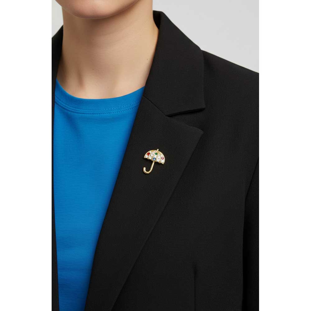 Model wearing Small crystal umbrella lapel tac pin on a black jacket with a blue top - Lilylin Designs