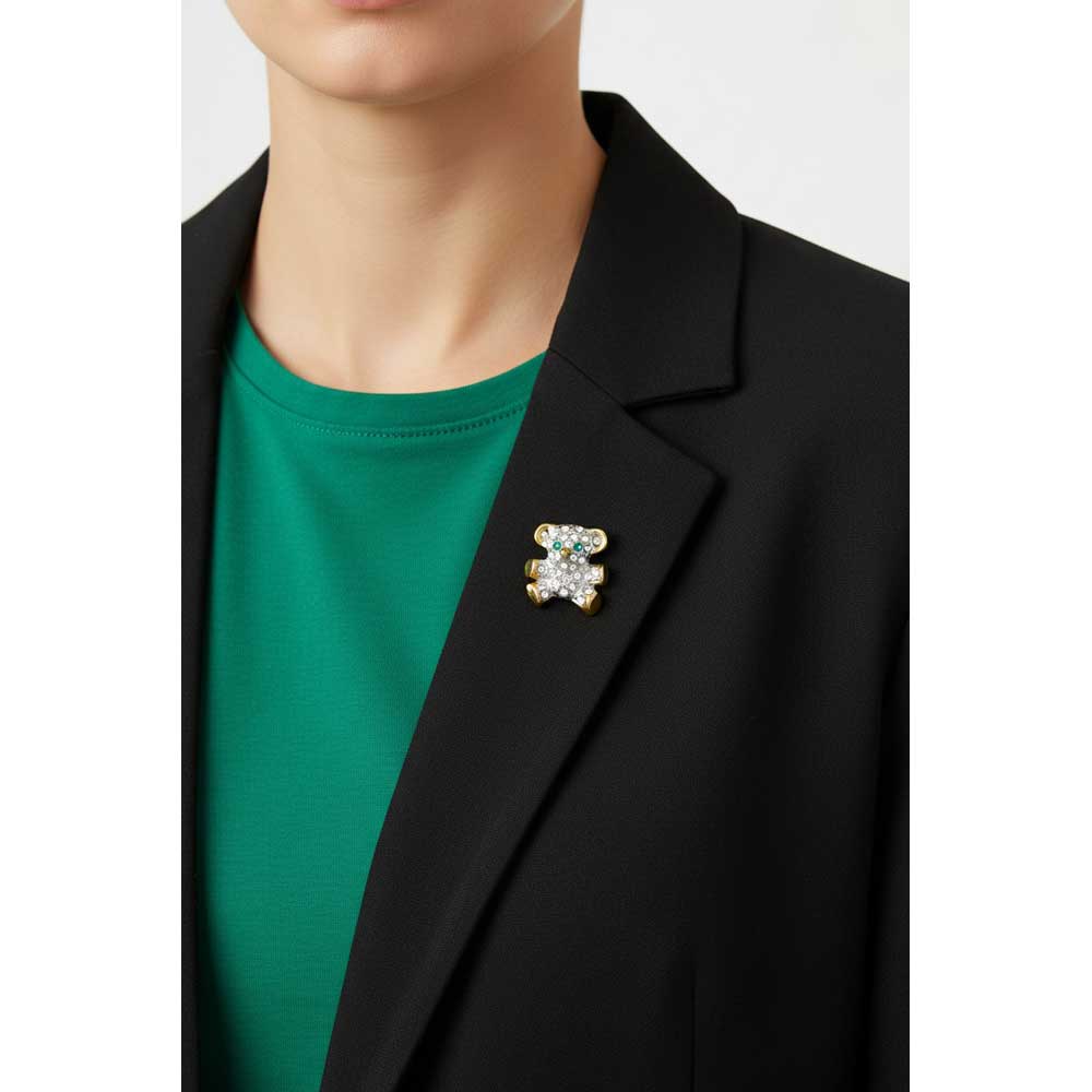 Model wearing Tiny teddy bear lapel tac pin on a black jacket with a green shirt - Lilylin Designs