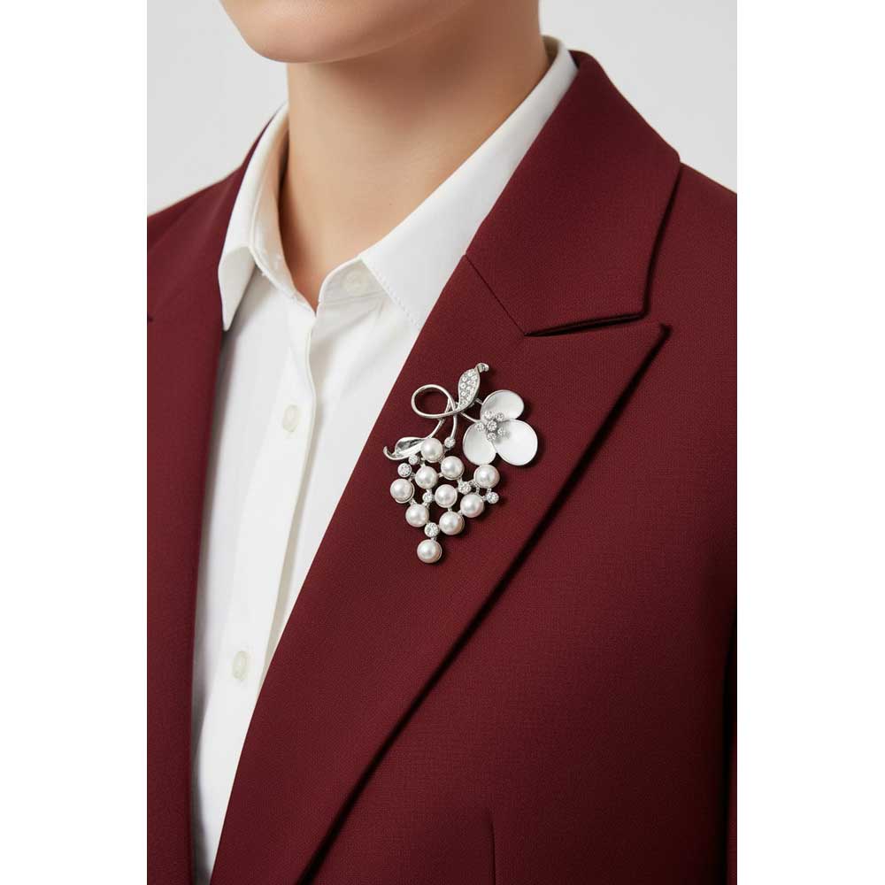 Model wearing White flower with pearls brooch pin on a dark red jacket with a white shirt - Lilylin Designs