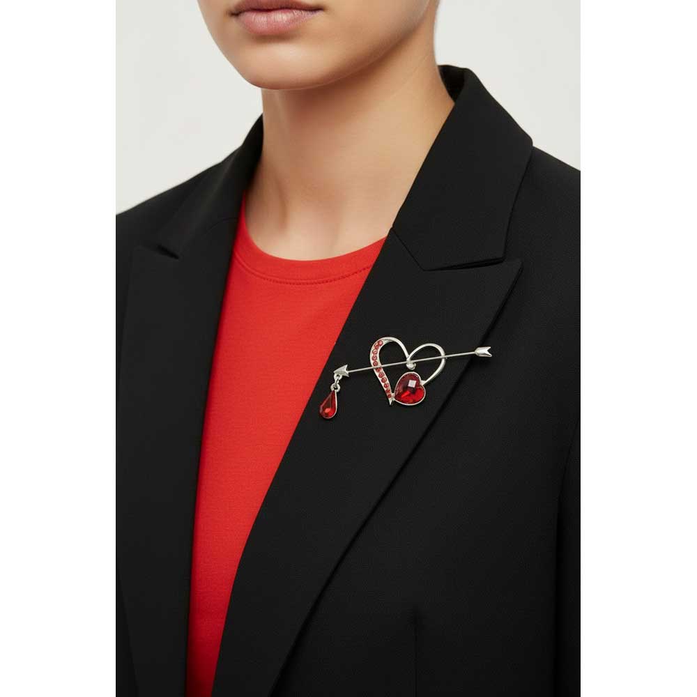 Model wearing bleeding heart brooch pin on a black jacket with a red top - Lilylin Designs