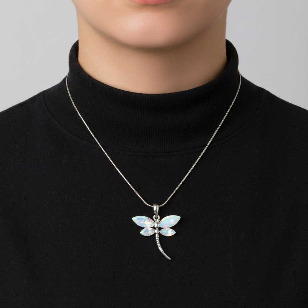 Model wearing crystal dragonfly necklace with a black turtleneck - Lilylin Designs