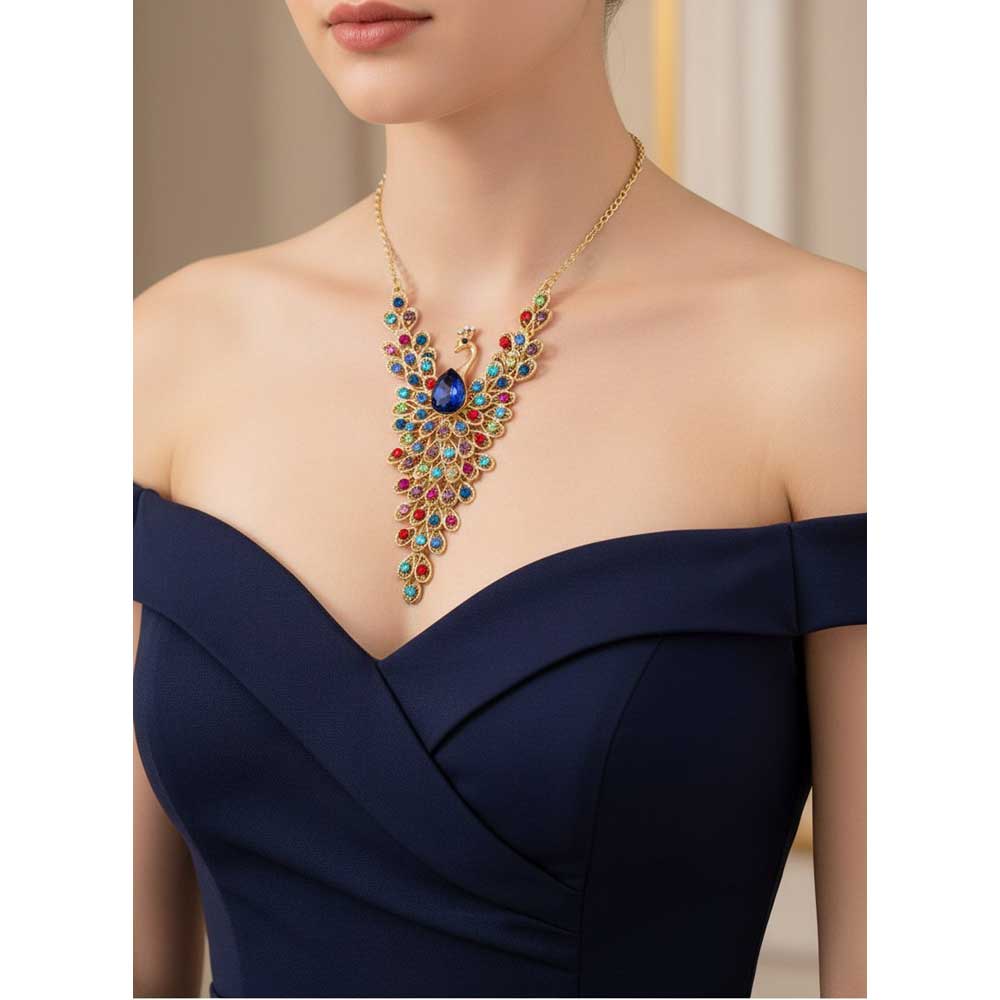 Model wearing crystal peacock necklace with a blue off the shoulder dress - Lilylin Designs