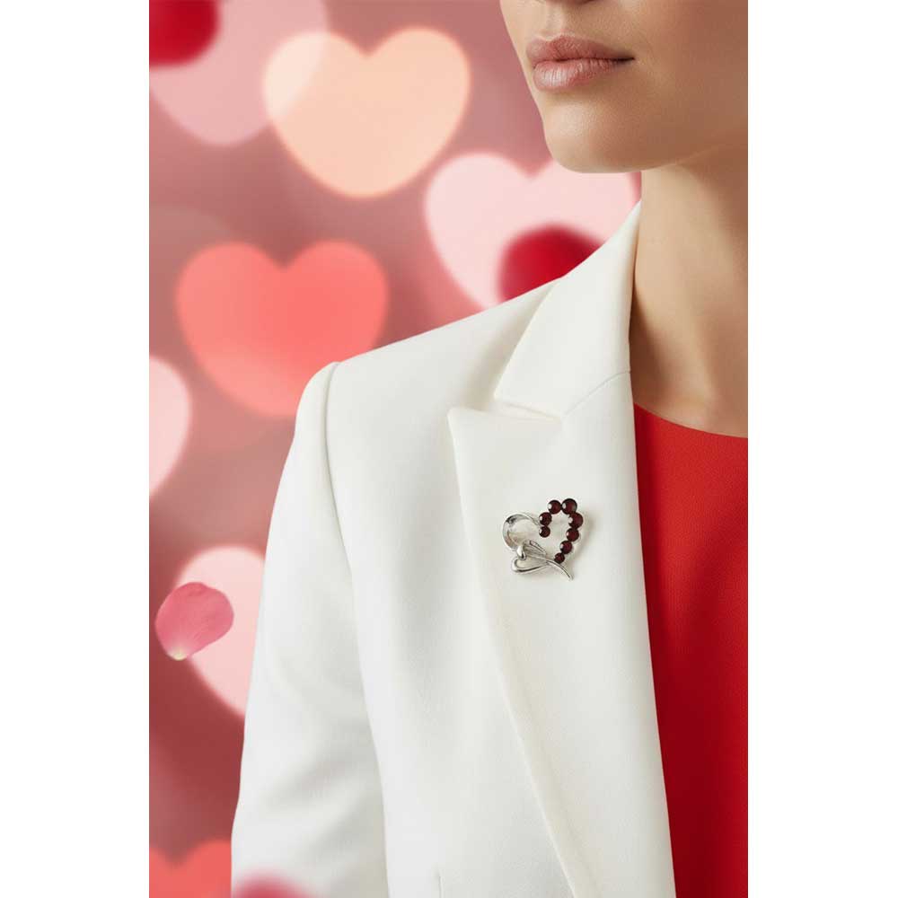 Model wearing dark red open heart brooch pin on a white jacket with a red top underneath - Lilylin Designs