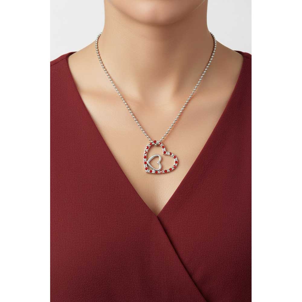Model wearing double heart necklace with a red top - Lilylin Designs