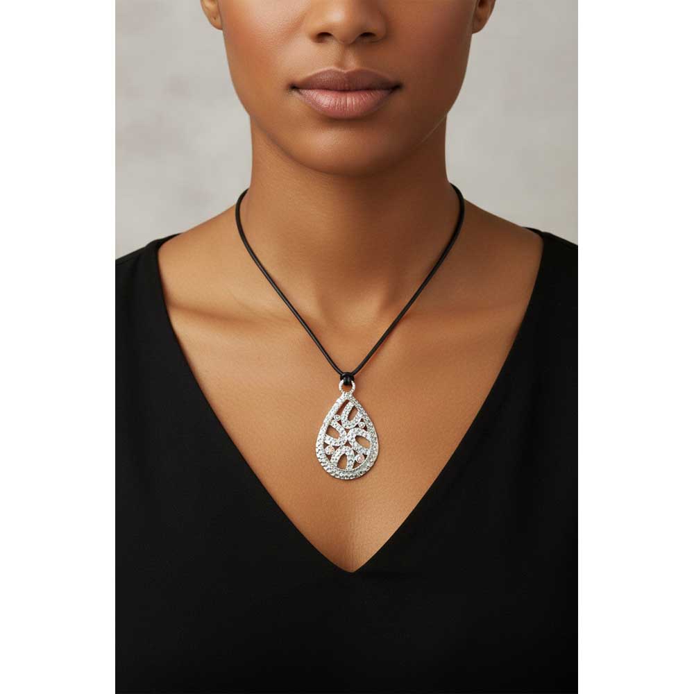 Model wearing hammered filigree teardrop necklace with rubber cord - Lilylin Designs