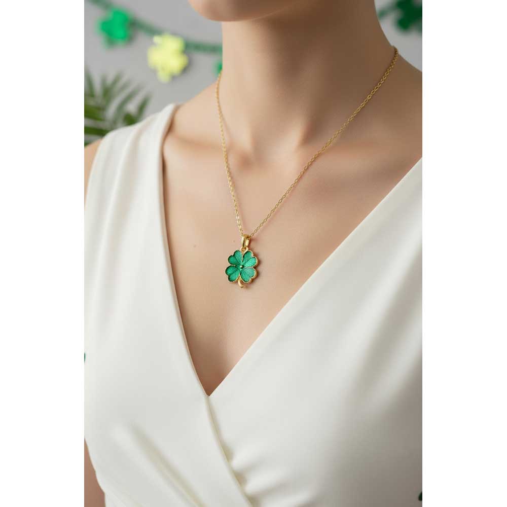 Model wearing green four leaf clover necklace with a white dress - Lilylin Designs