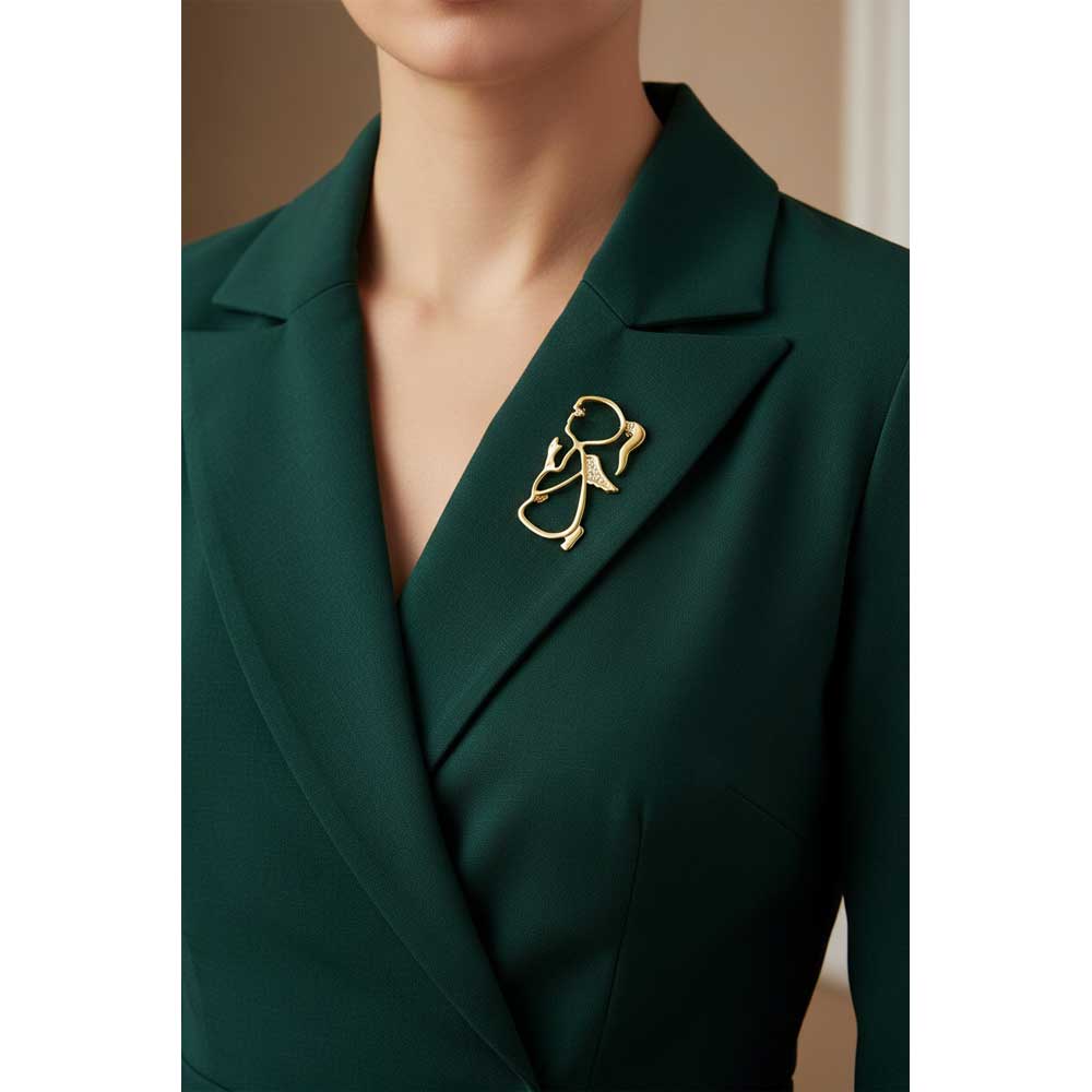 Model wearing gold praying angel girl pin on a dark green dress - Lilylin Designs