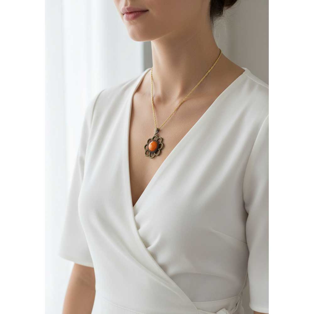 Model wearing Lilylin Designs orange handcrafted resin flower necklace