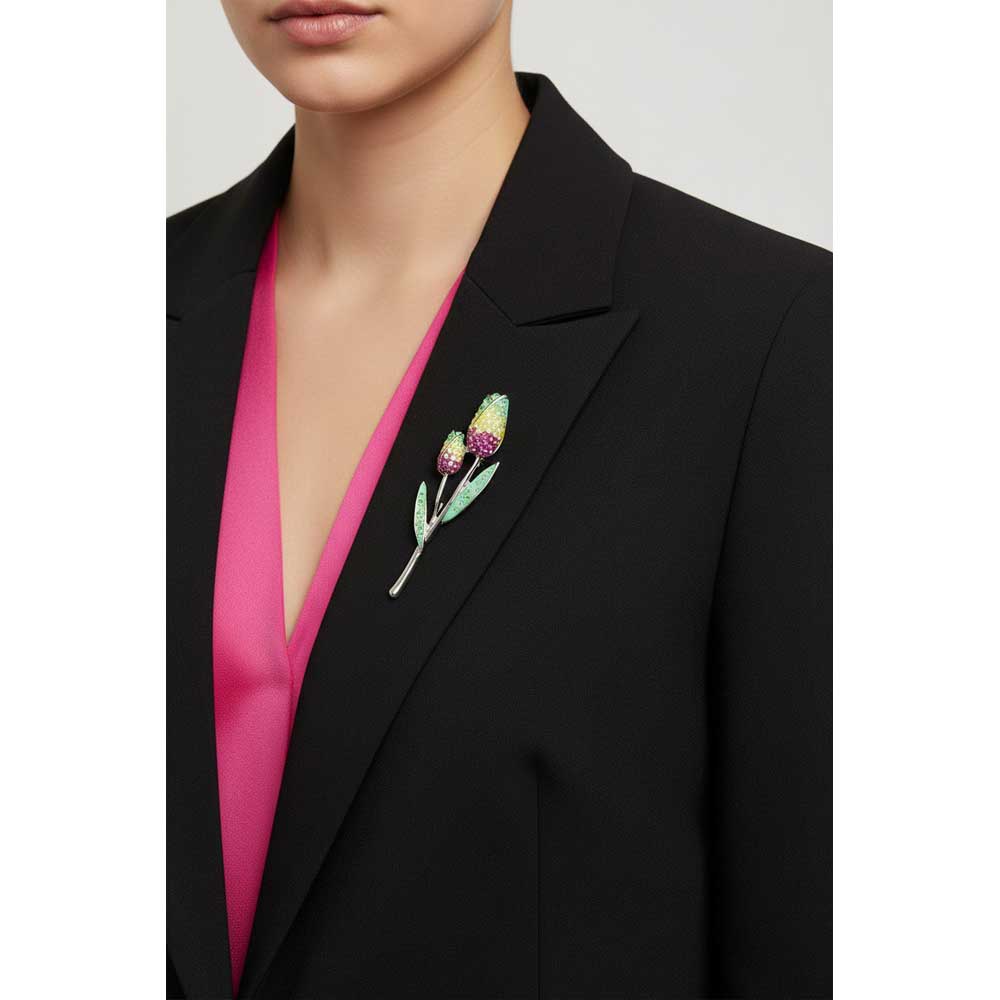 Model wearing pastel crystal rose buds brooch pin on a black jacket with a hot pink shirt - Lilylin Designs