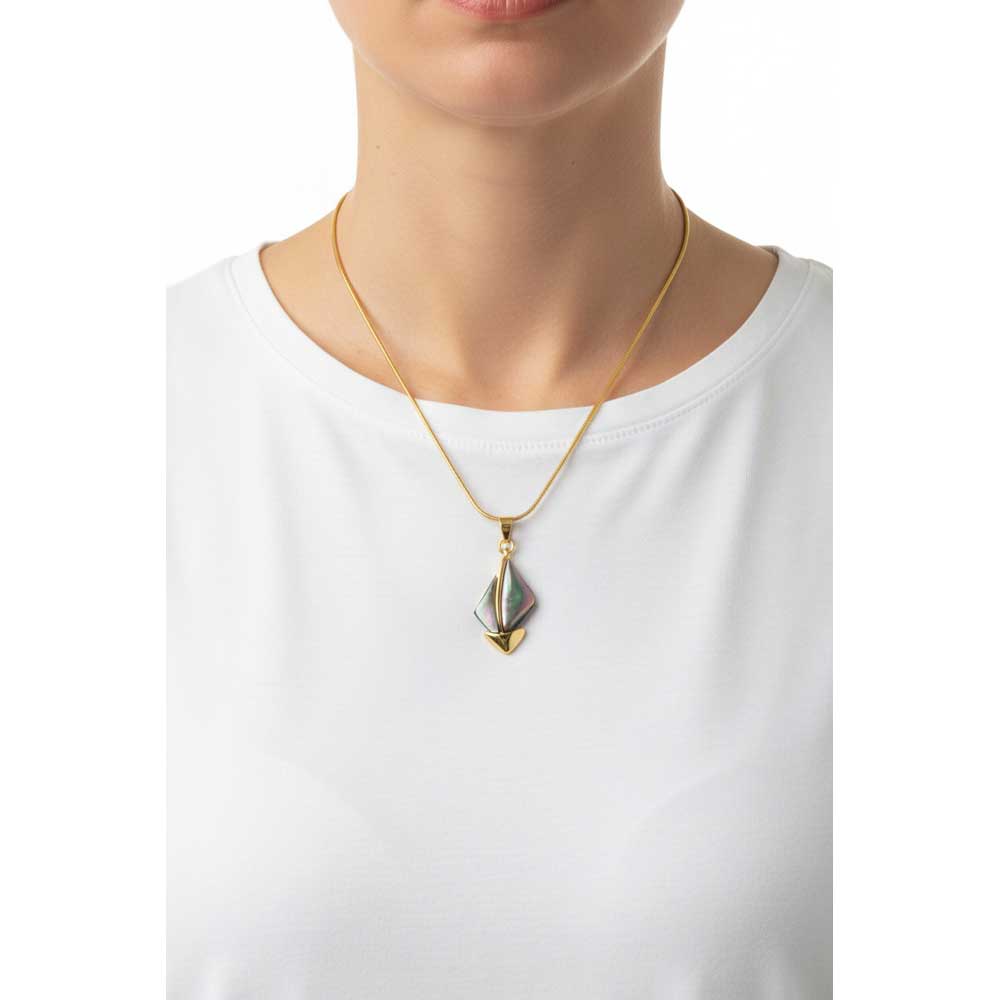 Model wearing shell sailboat necklace with a white t-shirt - Lilylin Designs