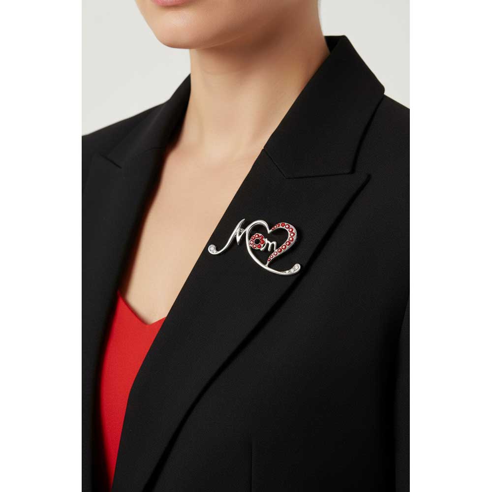 Model wearing silver red crystal stylized heart on a black jacket - Lilylin Designs