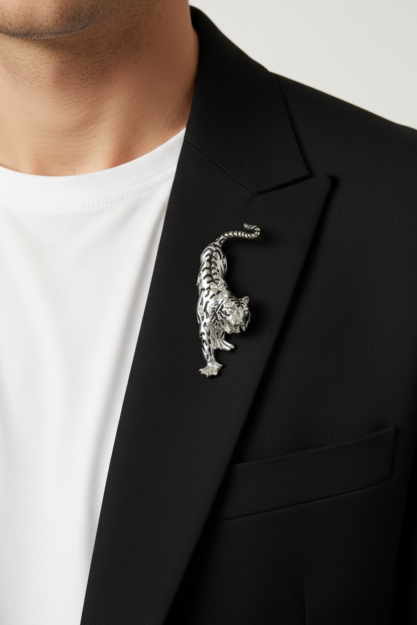 Model wearing stretching tiger brooch pin on a black jacket - Lilylin Designs