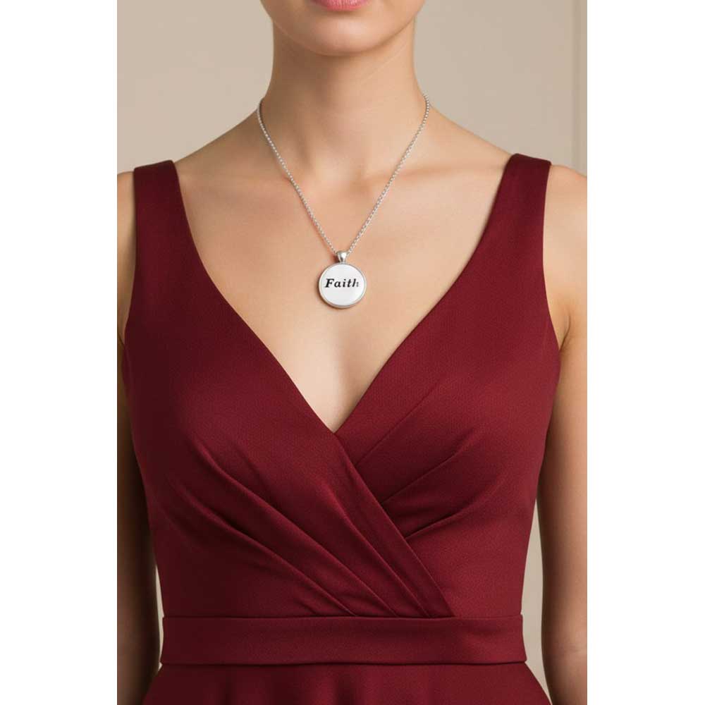 Model wearing Lilylin Designs with with black "Faith" necklace with a red dress