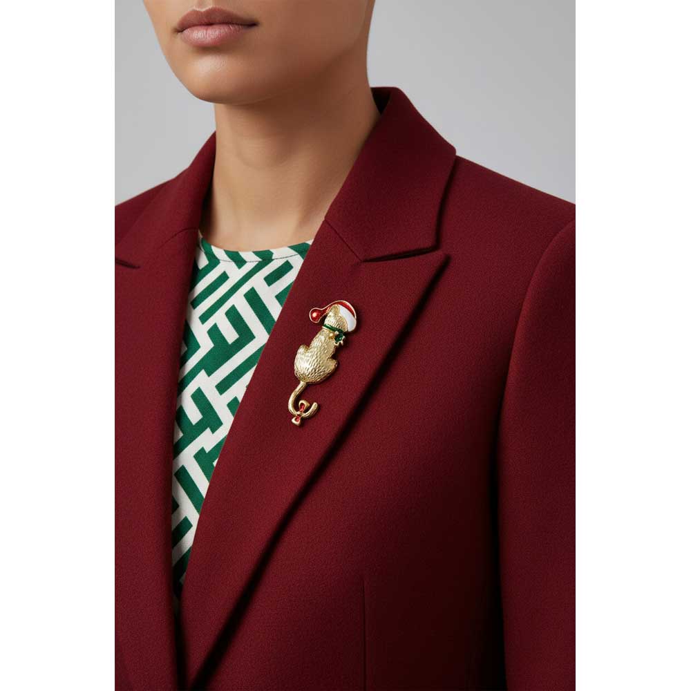 Model wearing gold Santa cat pin on a red jacket - Lilylin Designs