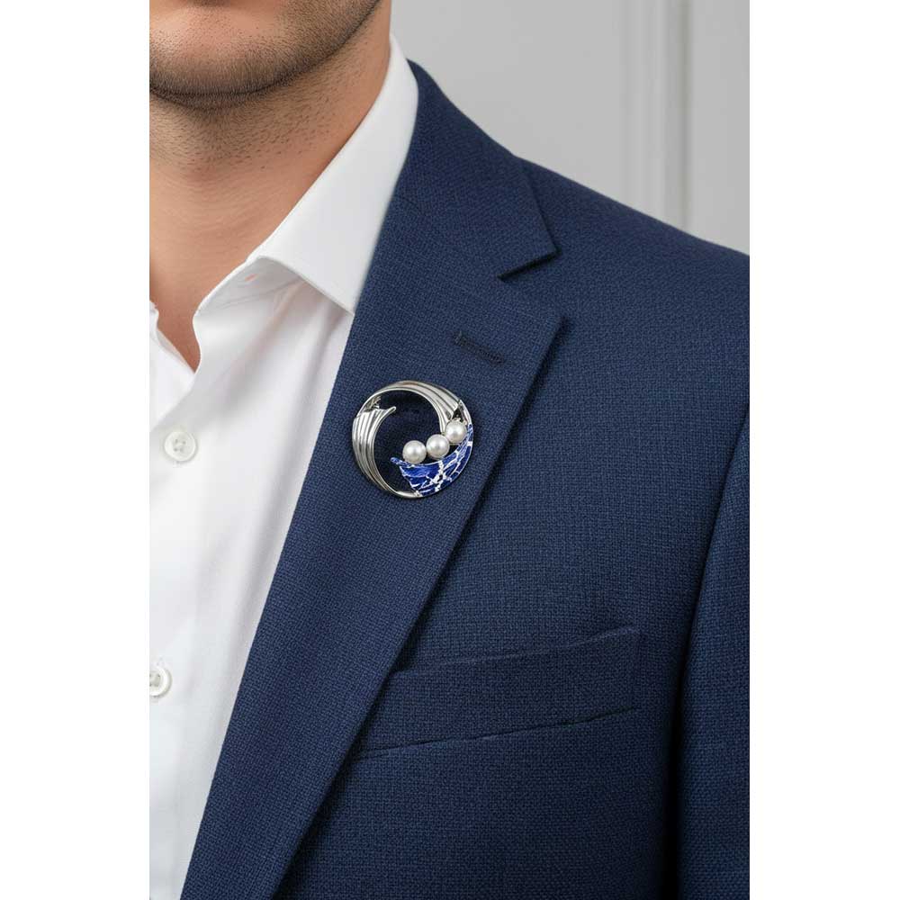 Man wearing pearl pin with wave design on a blue suit - Lilylin Designs