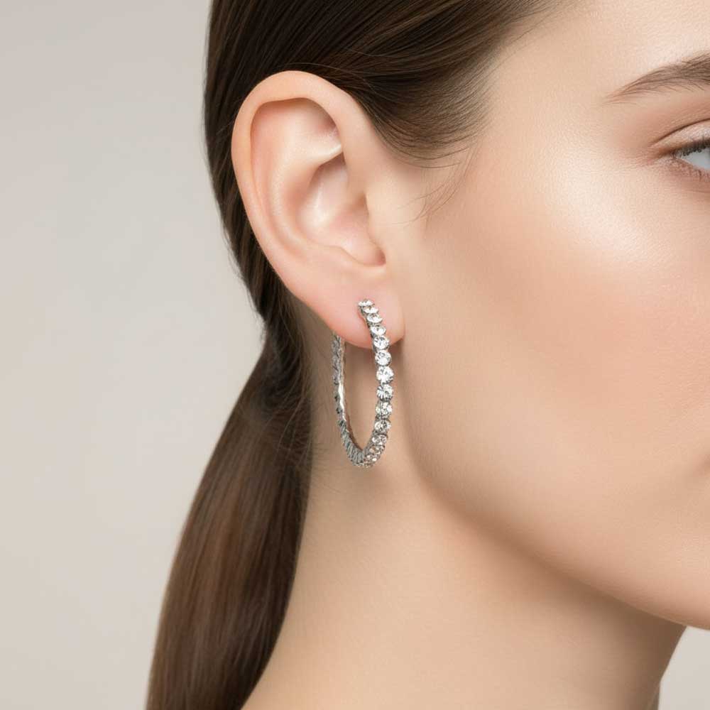 Model wearing clear crystal hoop earring - Lilylin Designs