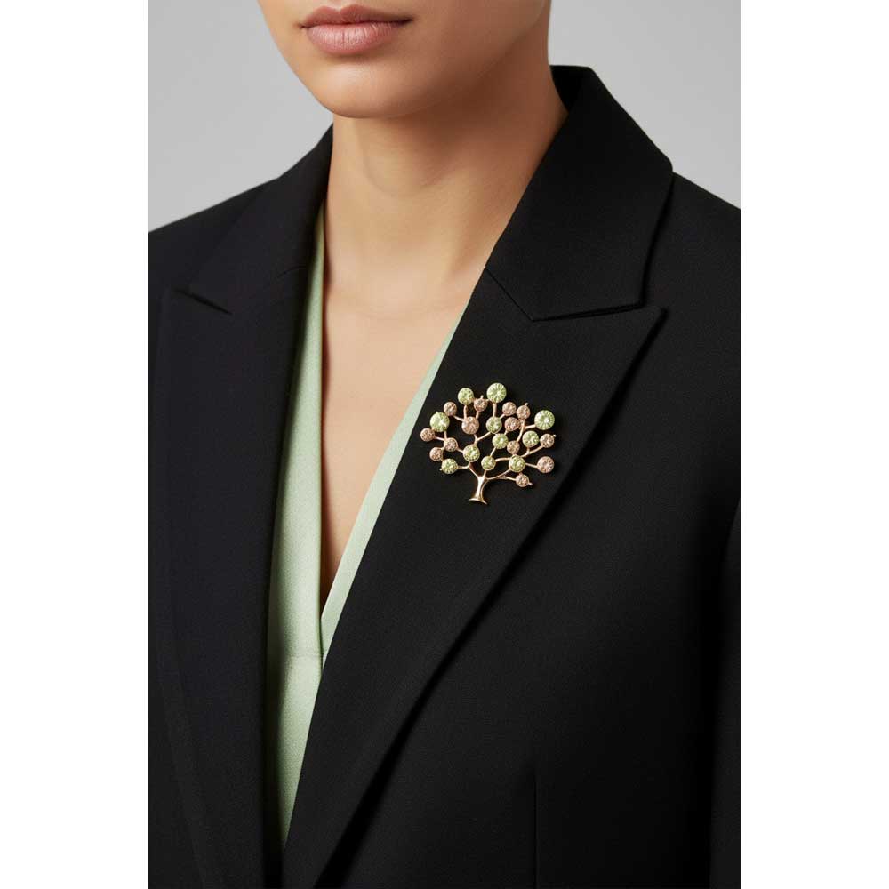 Model wearing brown and green tree of life brooch pin on a black jacket - Lilylin Designs