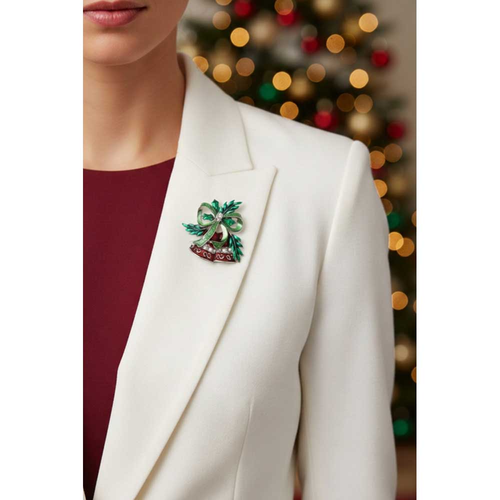 Model wearing red Christmas bells brooch pin on a white jacket with a red top - Lilylin Designs