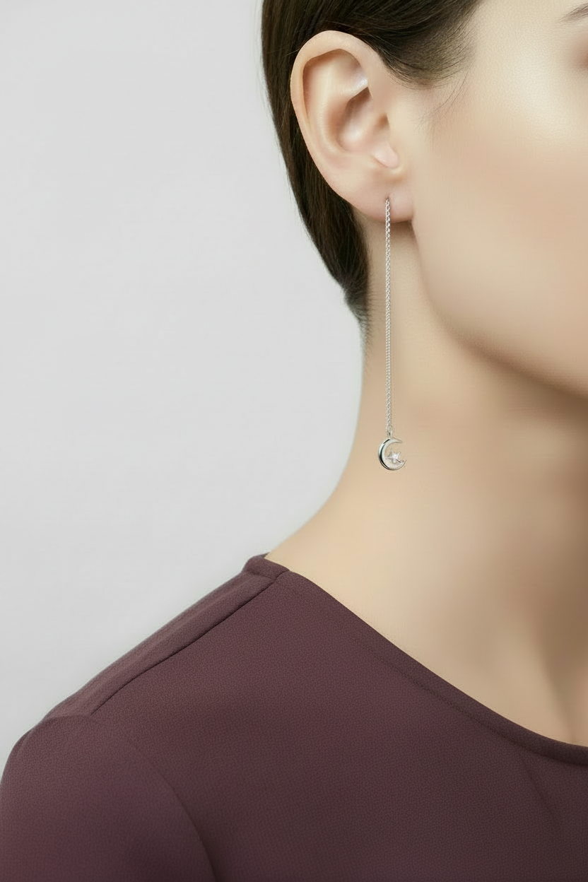 Model wearing moon and star dangle earring - Lilylin Designs