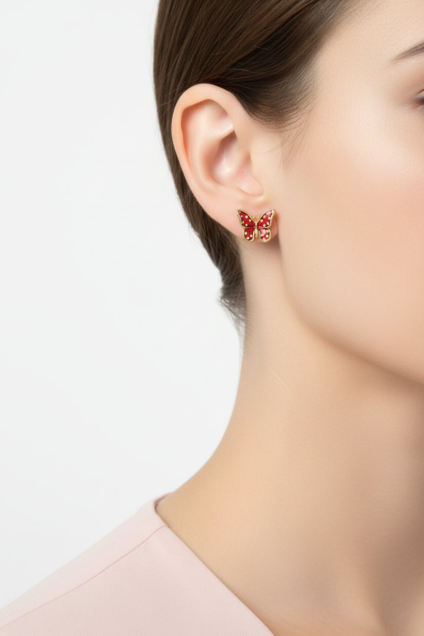 Model wearing orange and white speckled butterfly pierced earring - Lilylin Designs