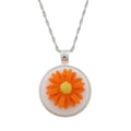 Orange and yellow daisy flower on white background with silver-tone chain - Lilylin Designs