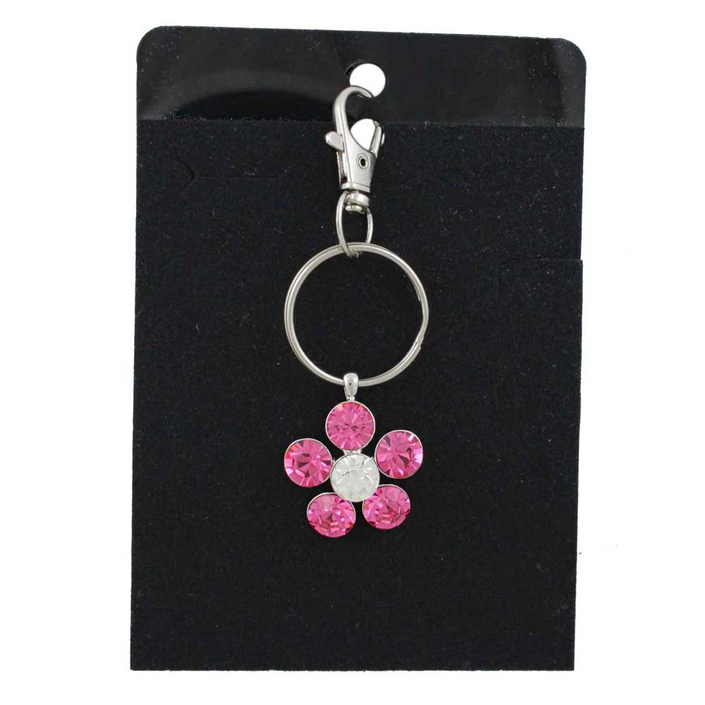 Pink crystal daisy flower keychain with clear center on a black background - Lilylin Designs