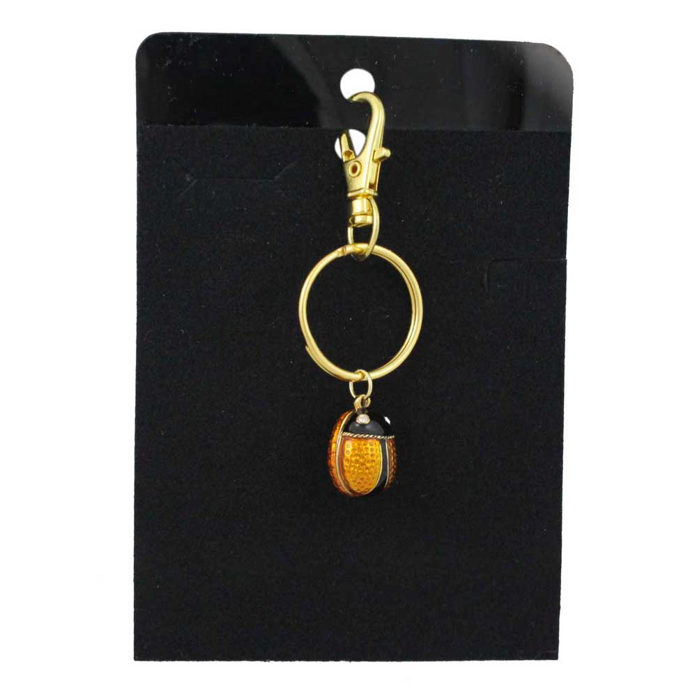 Gold keychain with a small brown ladybug charm on a black card - Lilylin Designs