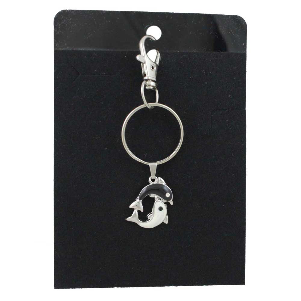 Keychain with black and white dolphins on a black card - Lilylin Designs