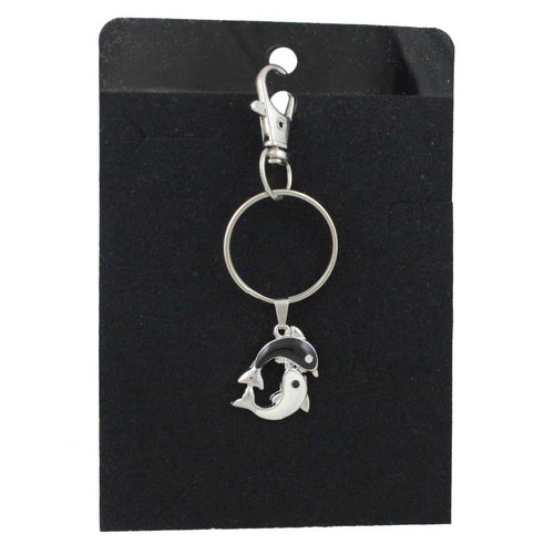 Keychain with black and white dolphins on a black card - Lilylin Designs