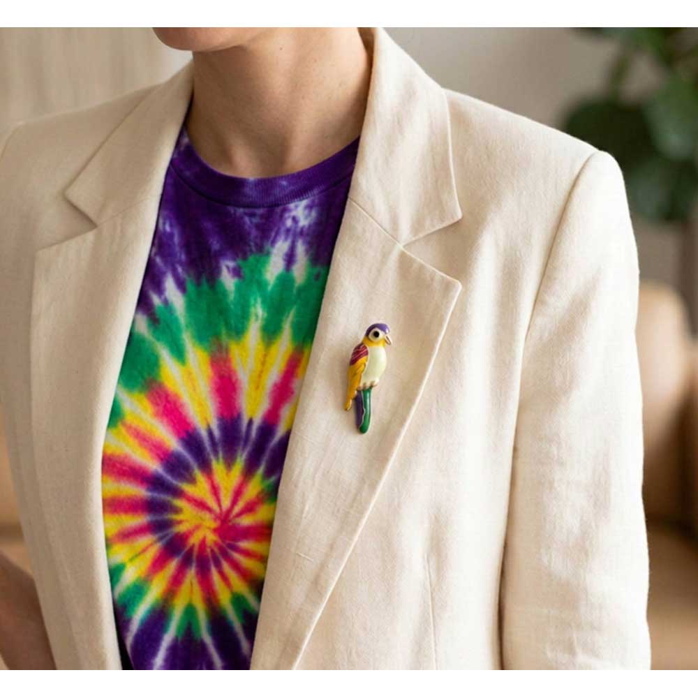 Bright Colorful Enamel Parrot Lapel Tac Pin on model with bright tie dye t-shirt - Lilylin Designs