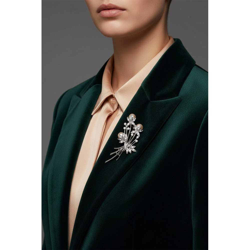Model wearing Peach pearl long stem flower buds pin on a dark green jacket - Lilylin Designs