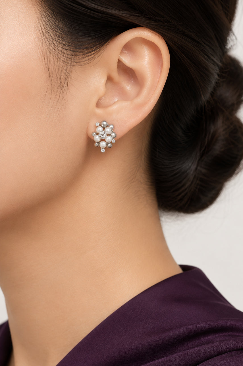 Model wearing white pearls with silver balls clip on earring - Lilylin Designs