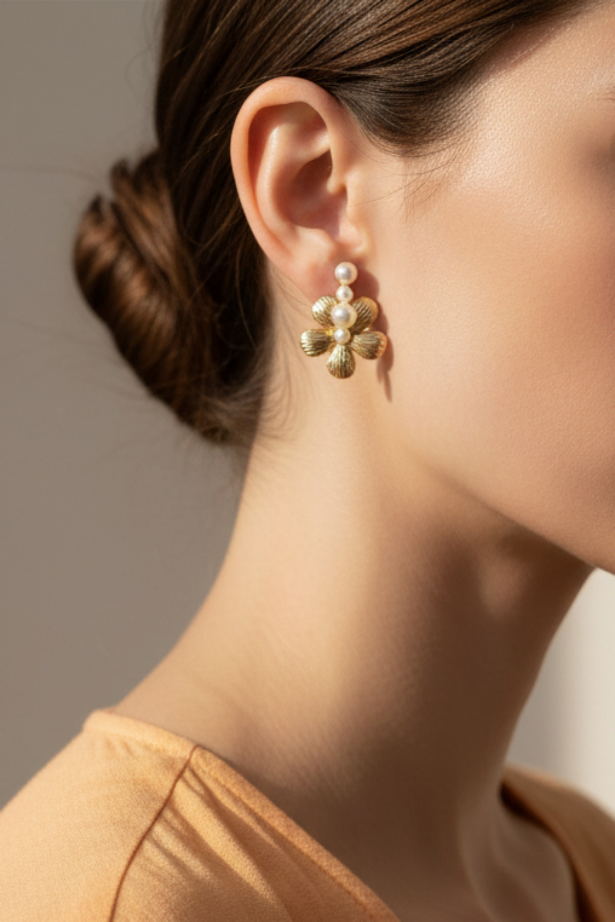 Model wearing pearl flower earring - Lilylin Designs