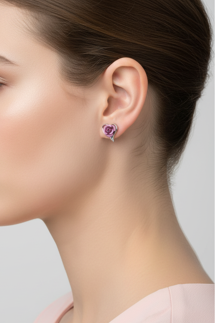 Model wearing silver heart with pink rose earring - Lilylin Designs