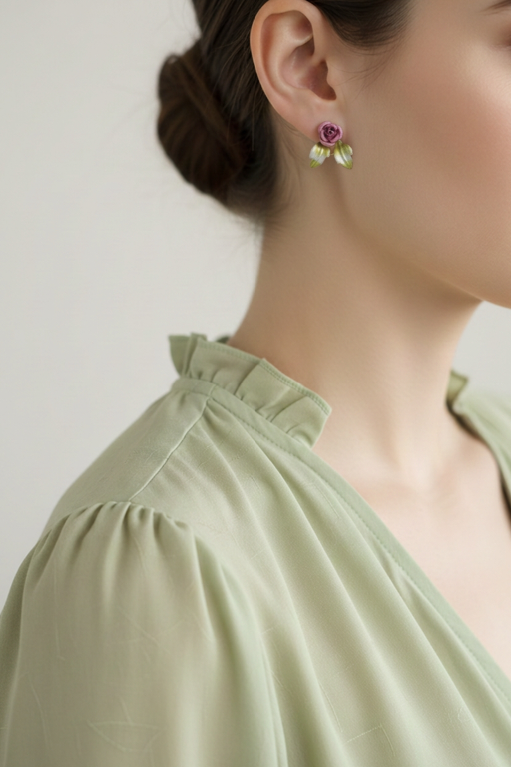 Model wearing pink rose with leaves stud earring - Lilylin Designs