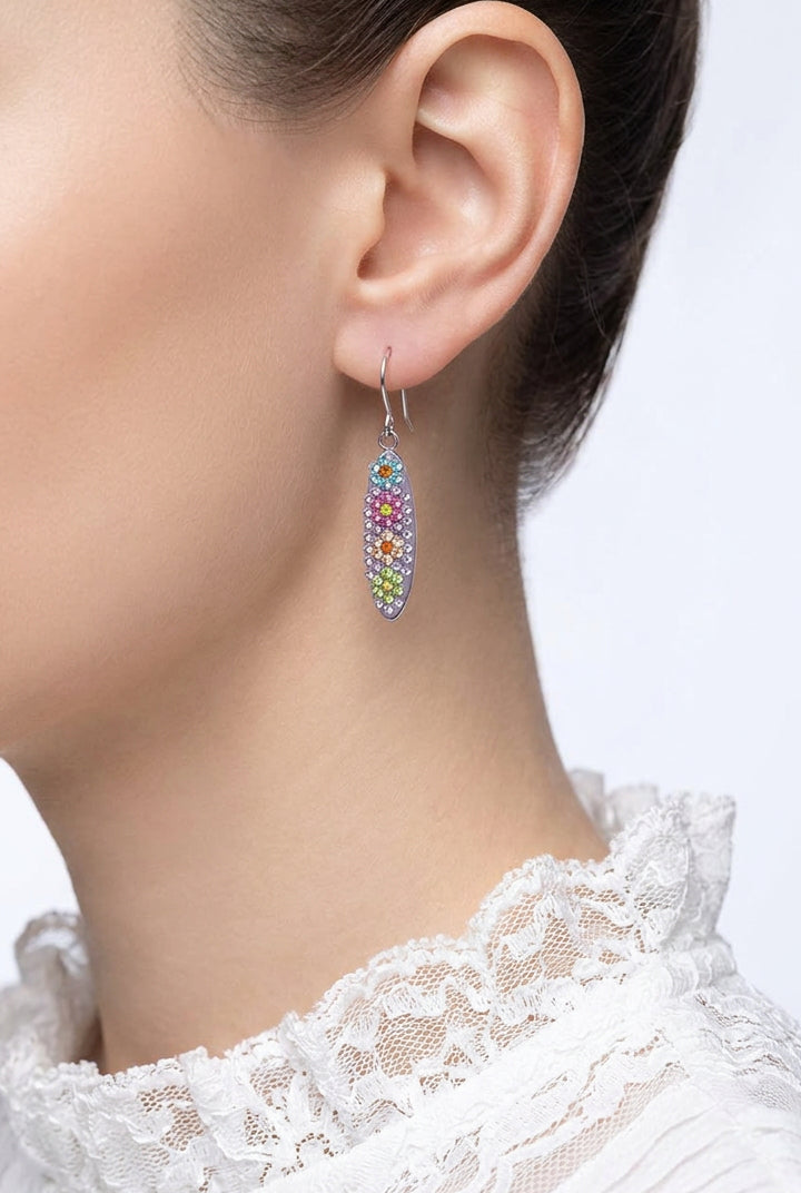 Model wearing purple crystal flowers encrusted dangling pierced earring  - Lilylin Designs