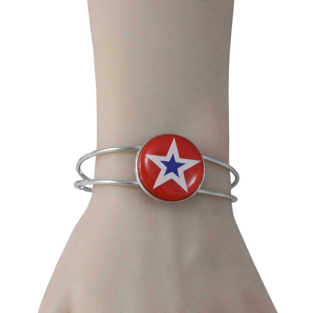 Bangle with a red disc featuring a blue and white star on a wrist - Lilylin Designs