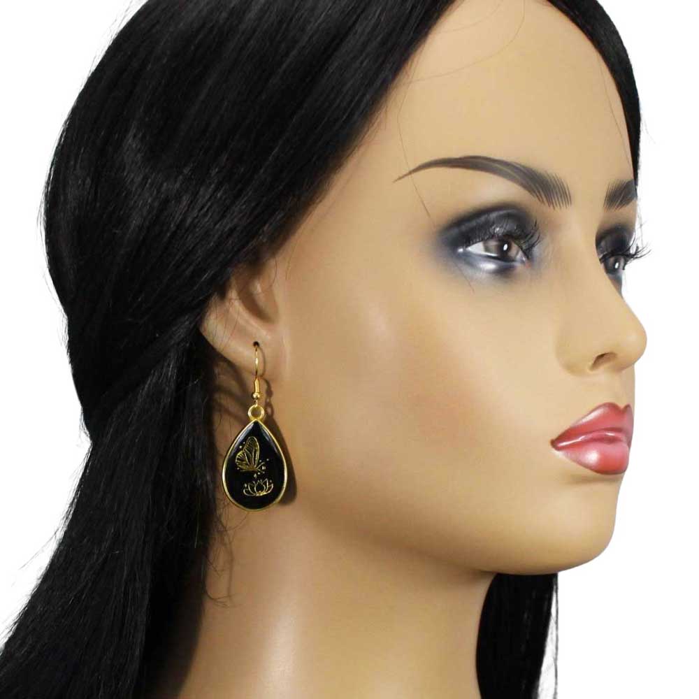 Model with black teardrop earring with gold butterfly - Lilylin Designs