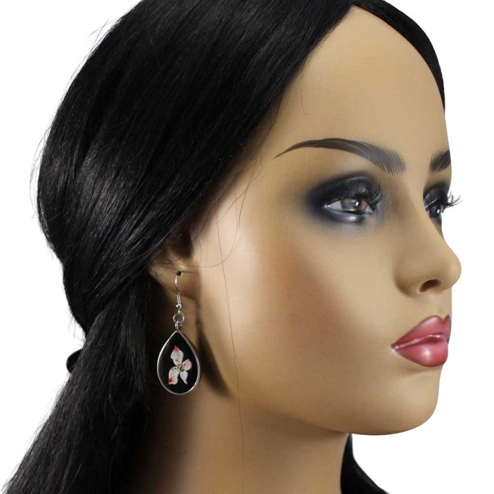 Model with Black Teardrop-shaped earrings with white and pink orchid - Lilylin Designs